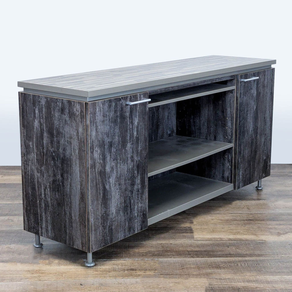 3. Angled view of Reperch sideboard and credenza, faux wood finish, two doors, and interior shelving.