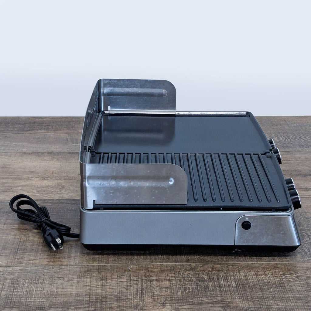 2. Side view of the GreenPan electric grill & griddle, showing ceramic nonstick plates and attached power cord.