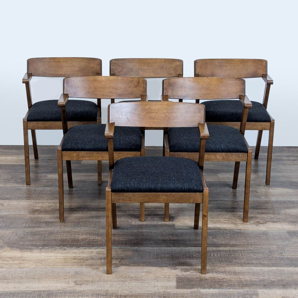 1. Set of six Article Zola dining chairs in licorice, solid wood frame, black padded foam seat, mid-century style.