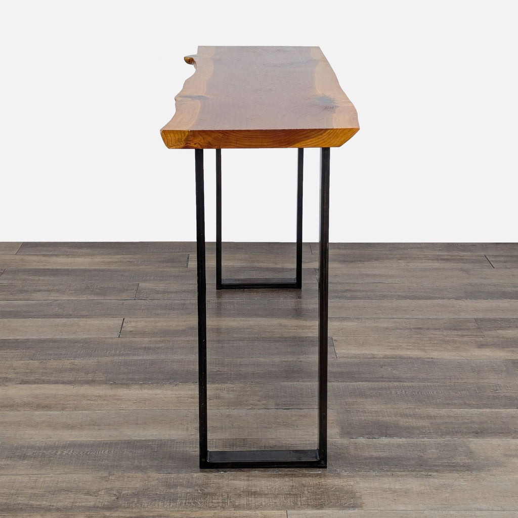 3. Slim Reperch side table with live edge wood surface and sturdy black metal sled legs, side profile view.