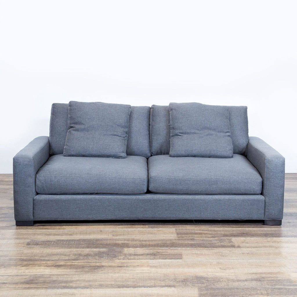 1. Front view of a modern, plush dark gray 3-seat Metro sofa by Room & Board with clean lines.  