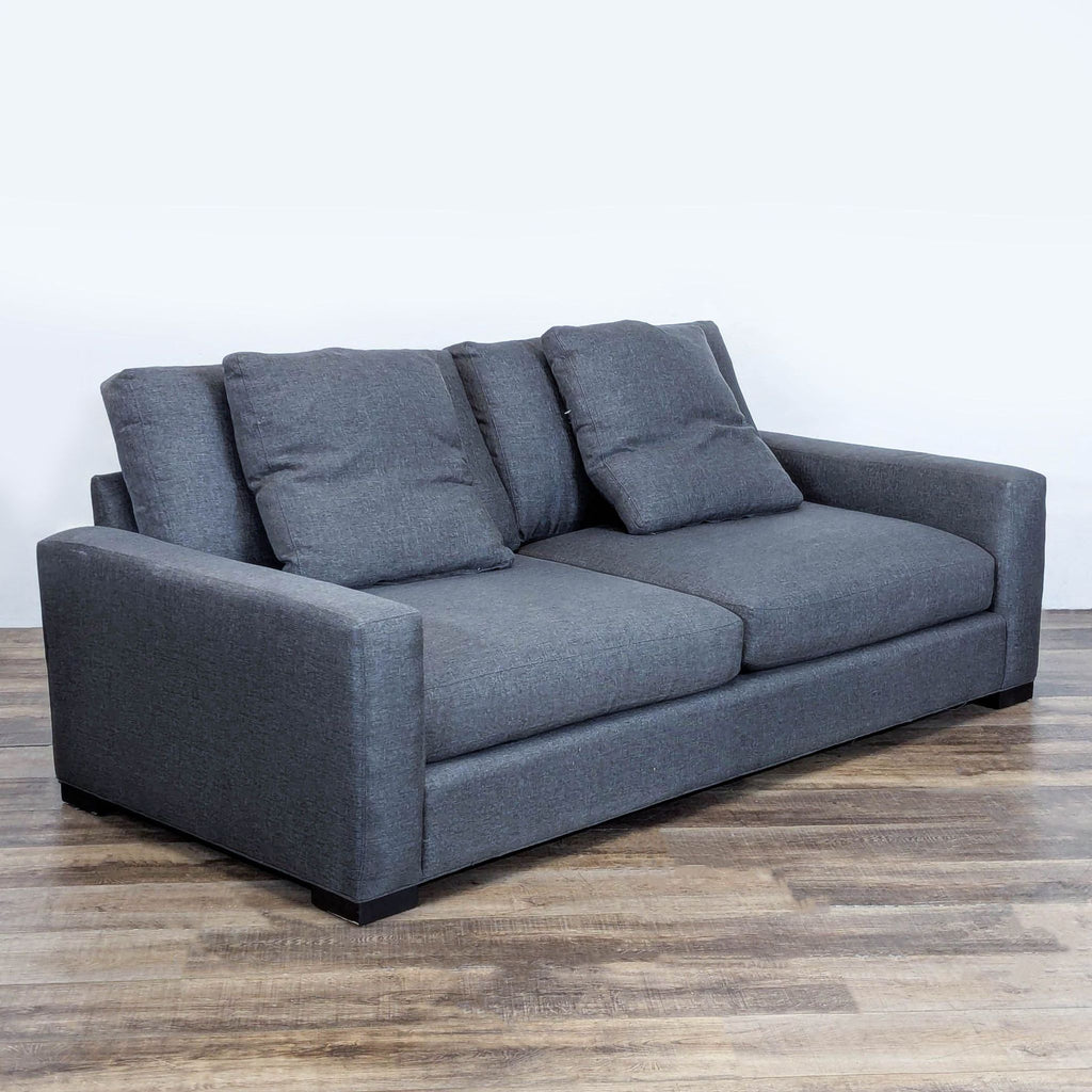 3. Angled perspective highlighting the sleek design and comfort of the 3-seat Metro sofa by Room & Board.