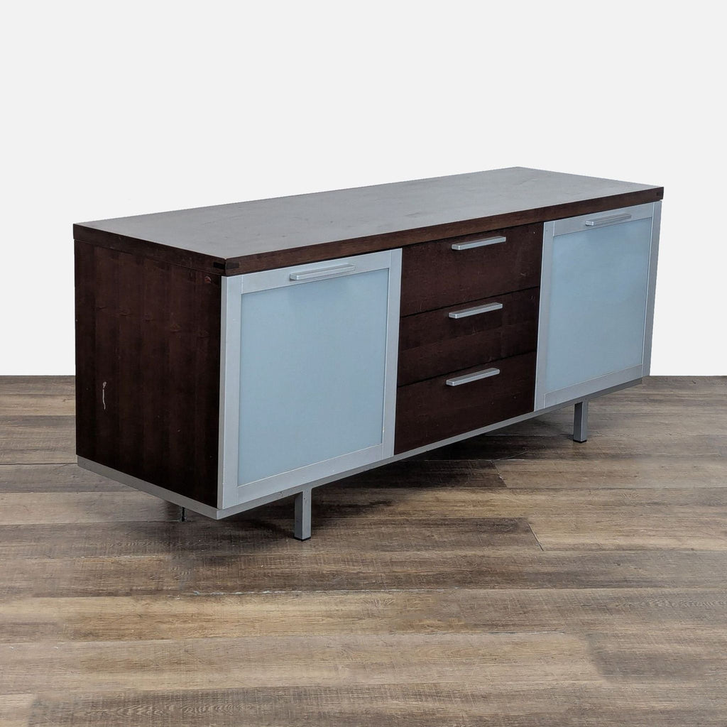 3. Angled view of a Calligaris sideboard, highlighting frosted glass doors, three drawers, and modern metal legs.