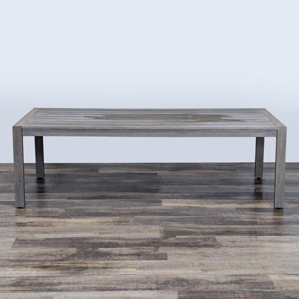 1. Weathered teak table with planked top by Restoration Hardware, rectangular design, placed on wood floor.