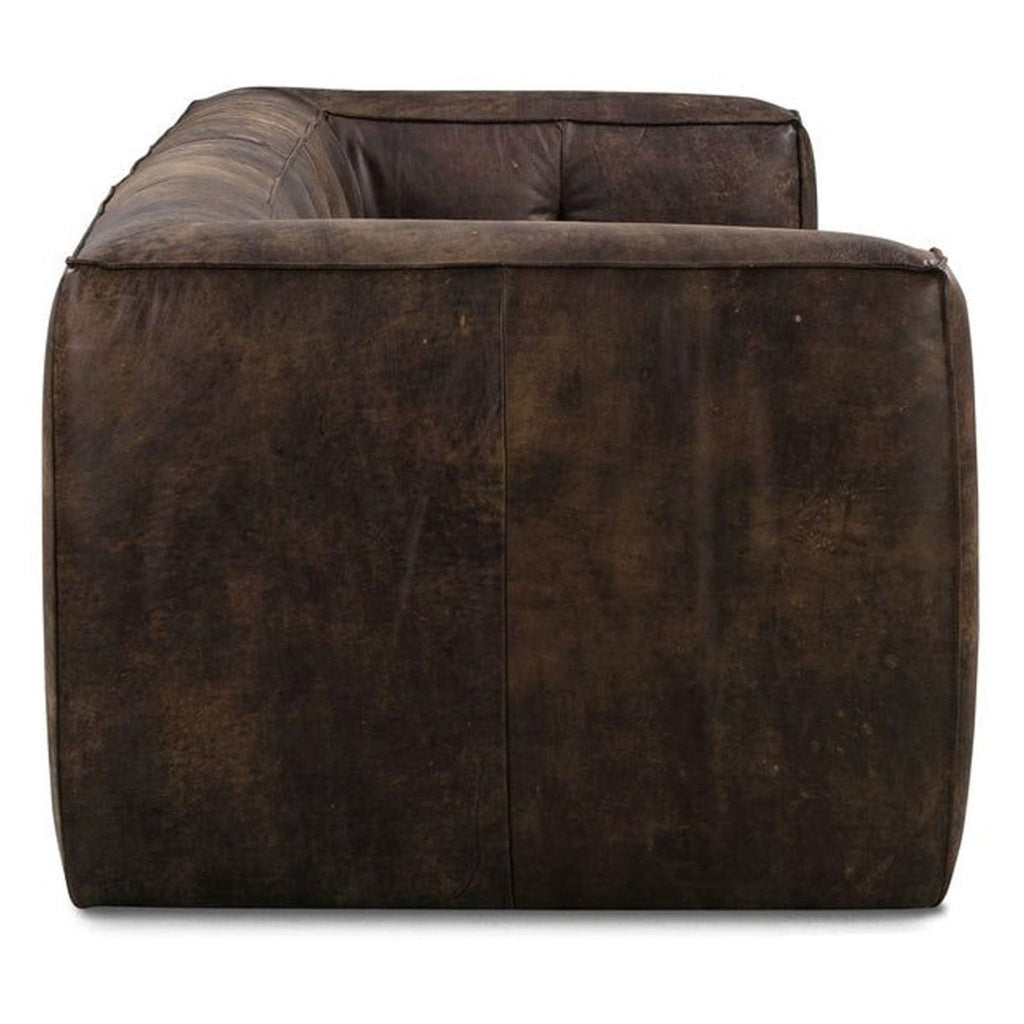 2. Side view of a boxy, low-back Poly & Bark 3-seat sofa upholstered in rich Outback Brown Leather.