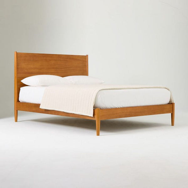 1. Wooden bed frame with acorn finish and matching headboard, shown fully assembled with white bedding.