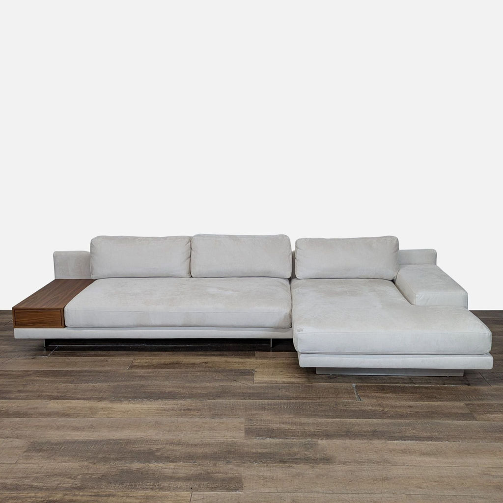 1. Modern Rove Concepts sectional with cloud-like cushions, chaise, and a built-in walnut veneer side table.