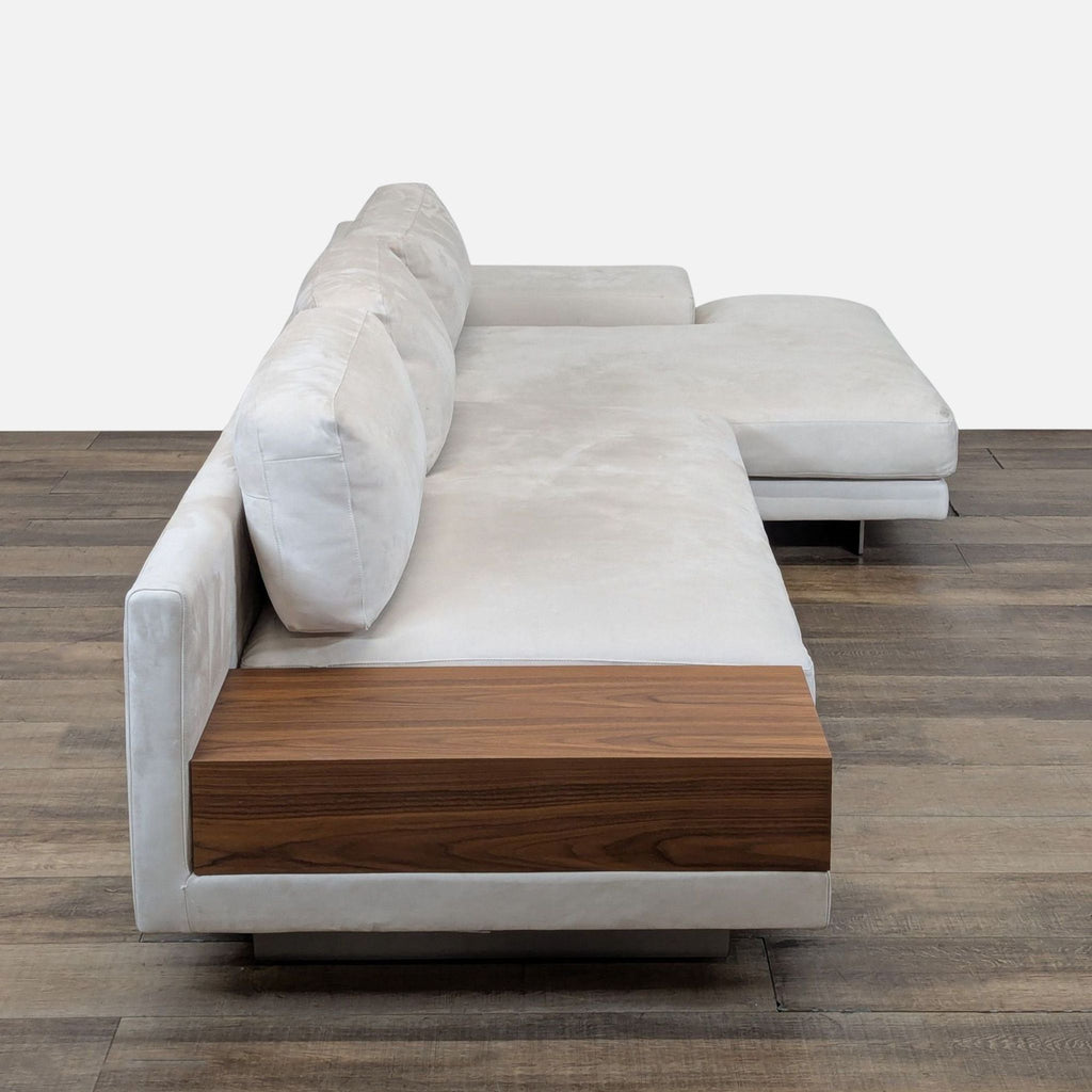 2. Side view of a low-profile Rove Concepts sectional, highlighting the walnut veneer side table attachment.