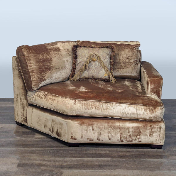 1. Velvet corner chair by Executive Seating Corp. in beige and brown, topped with a decorative fringed pillow.  