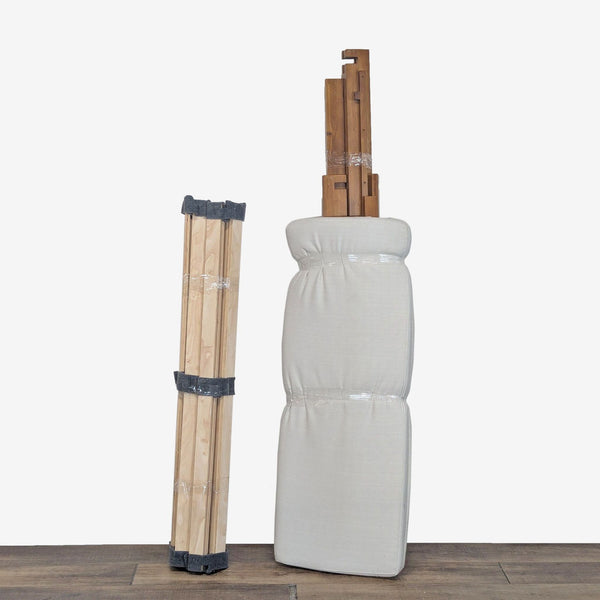 1. Thuma frame parts and linen pillowboard, compactly packed and ready for assembly using Japanese joinery.  