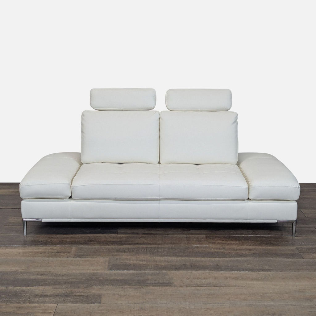 1. Modani white loveseat with sleek, low profile, featuring leather upholstery and upright headrests.