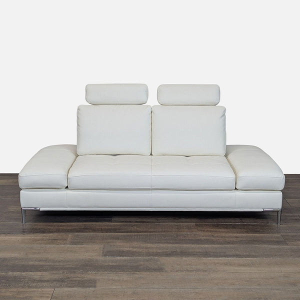 1. Modani white loveseat with sleek, low profile, featuring leather upholstery and upright headrests.