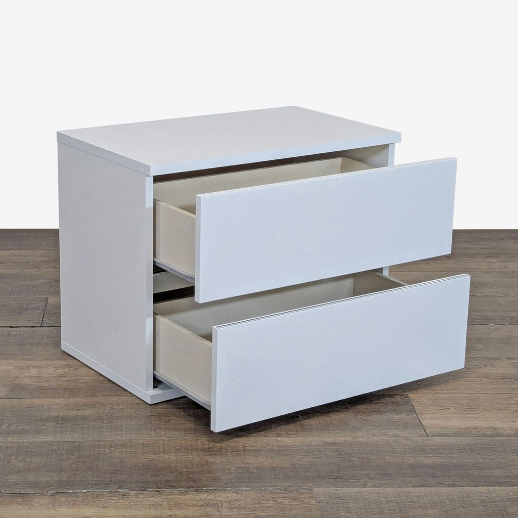 2. Angled view of the Status end table with both drawers open, highlighting its spacious storage.  