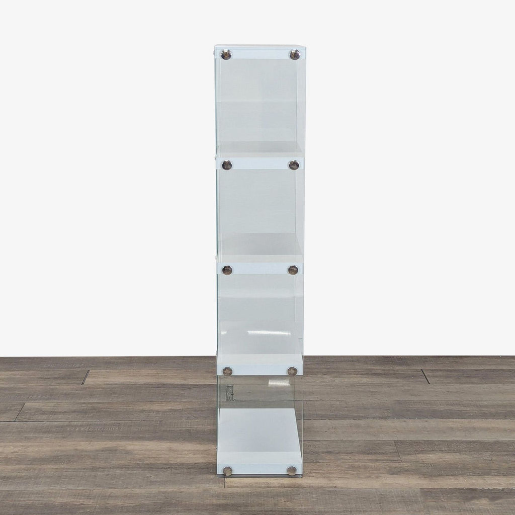 2. Side view of Every Room bookshelf showing slim profile, tempered glass construction, and chrome shelf supports.