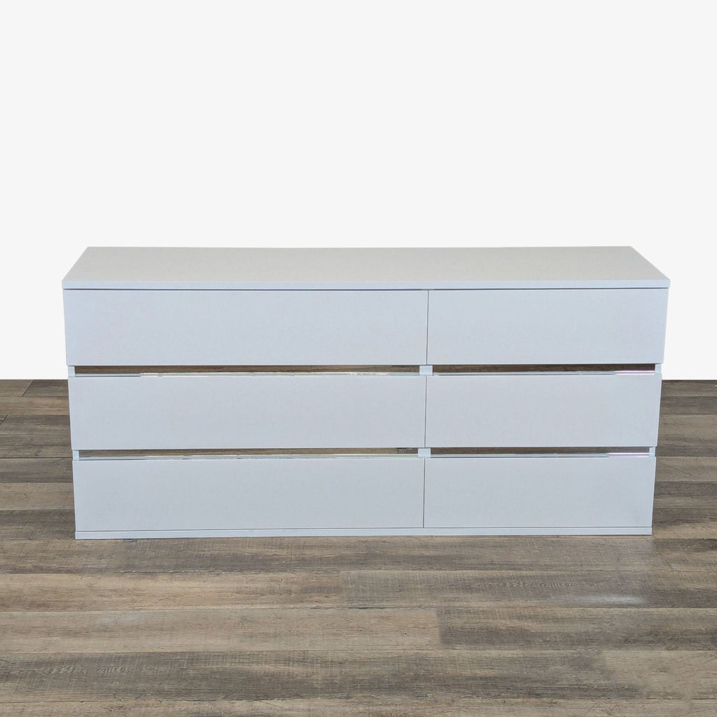 Front view of a Status brand glossy white large dresser with 6 drawers, modern design, made in Italy.