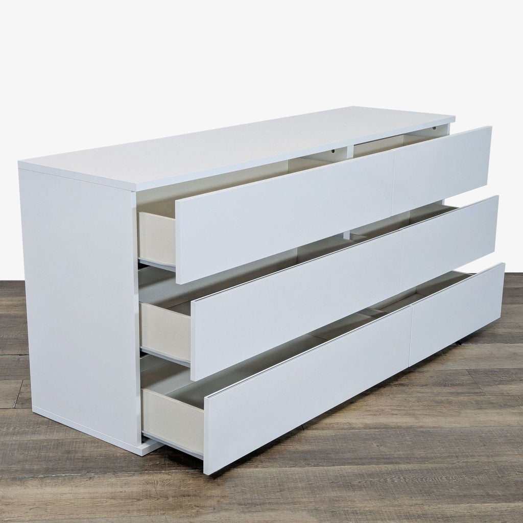 Angled view showing the Status white gloss dresser with all six drawers open, modern Italian style.