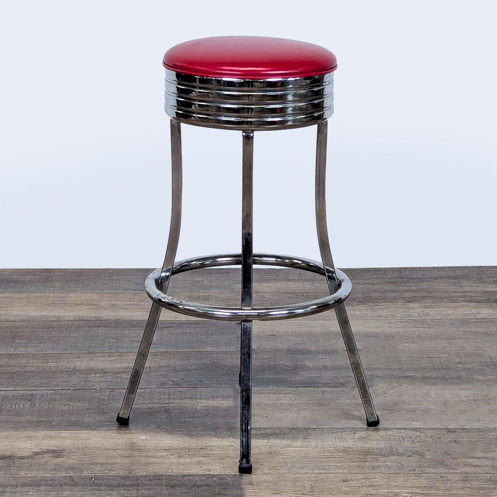 2. Chrome-legged Vitro stool with circular red vinyl seat, shown on a wood floor for stools, ottomans & benches.