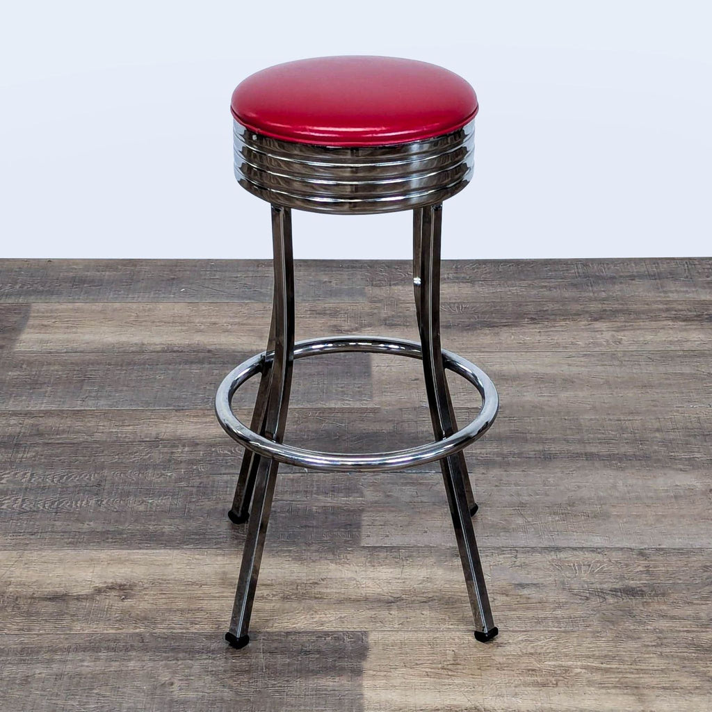3. Classic diner stool from Vitro, featuring a shiny chrome base and round red padded seat, ideal for seating.