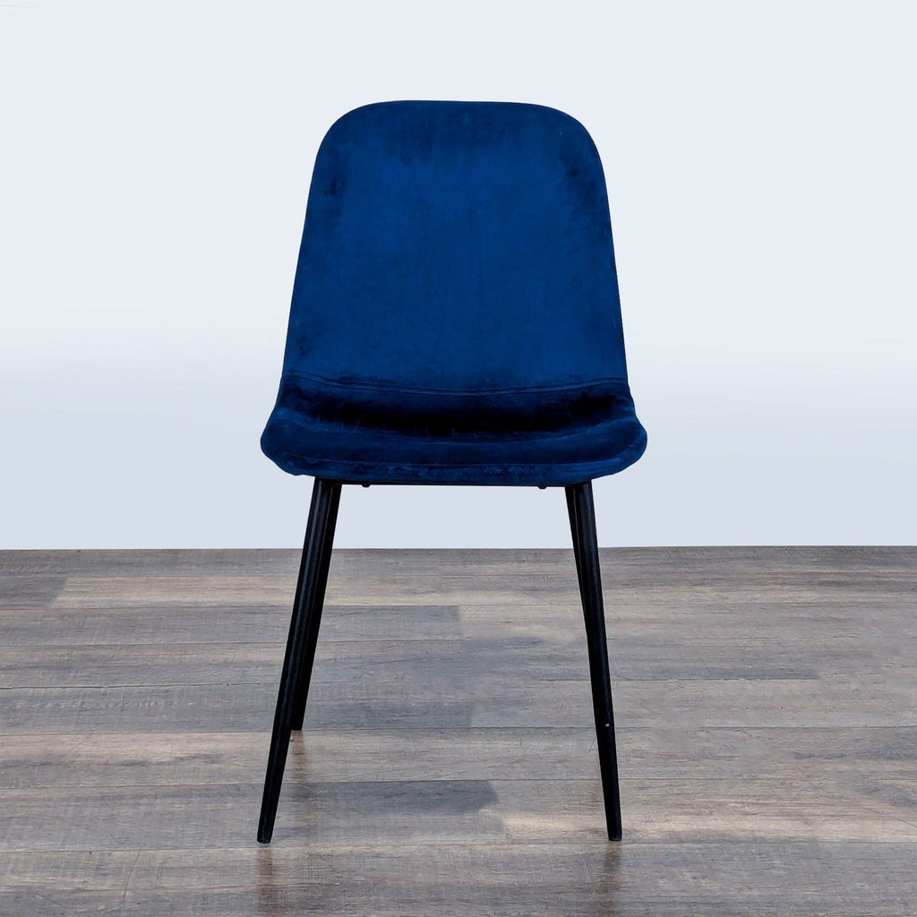 1. Reperch dining chair with a blue fabric seat and black metal legs, shown from the front on wood floor.