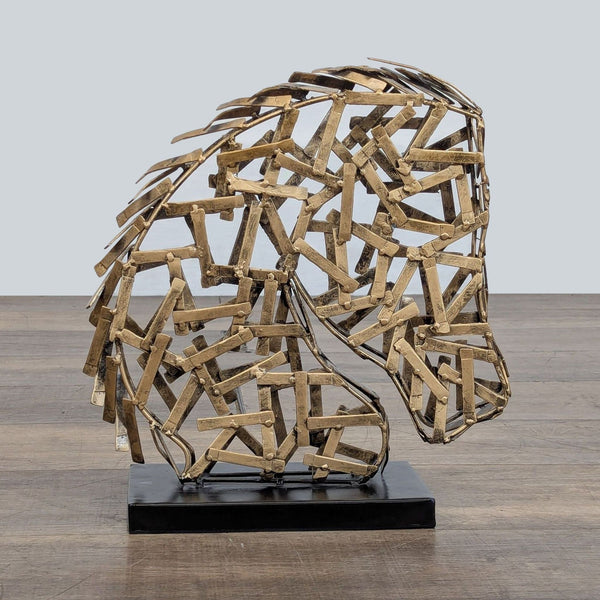 1. Artistic sculpture of a wild stallion’s head in antiqued goldtone metal by Ashley Furniture, shown from the front.
