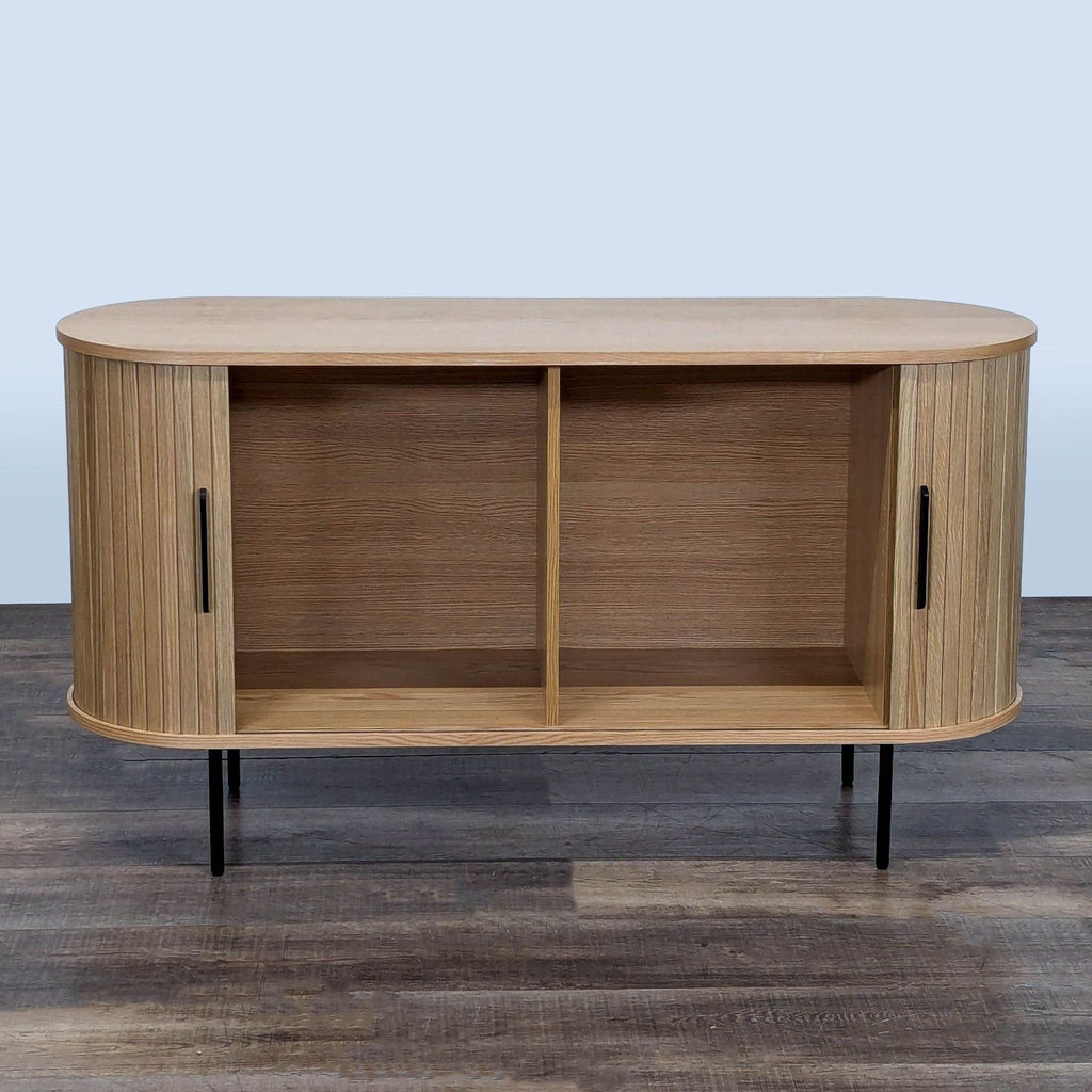 2. Entertainment center by AllModern showing open sliding doors and spacious interior compartments for storage.  