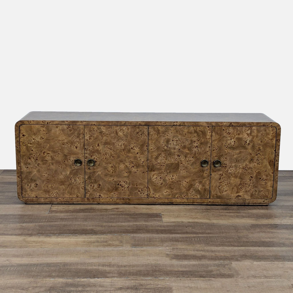 1. Restoration Hardware entertainment center with Art Deco-inspired mappa burl veneer, geometric silhouette, and brass hardware.  