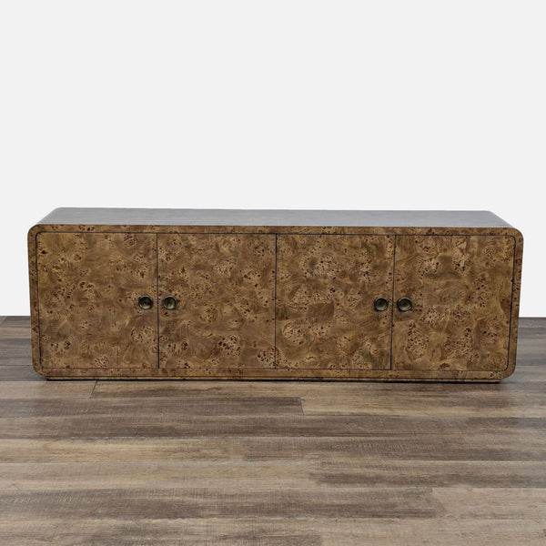 1. Restoration Hardware entertainment center with Art Deco-inspired mappa burl veneer, geometric silhouette, and brass hardware.  