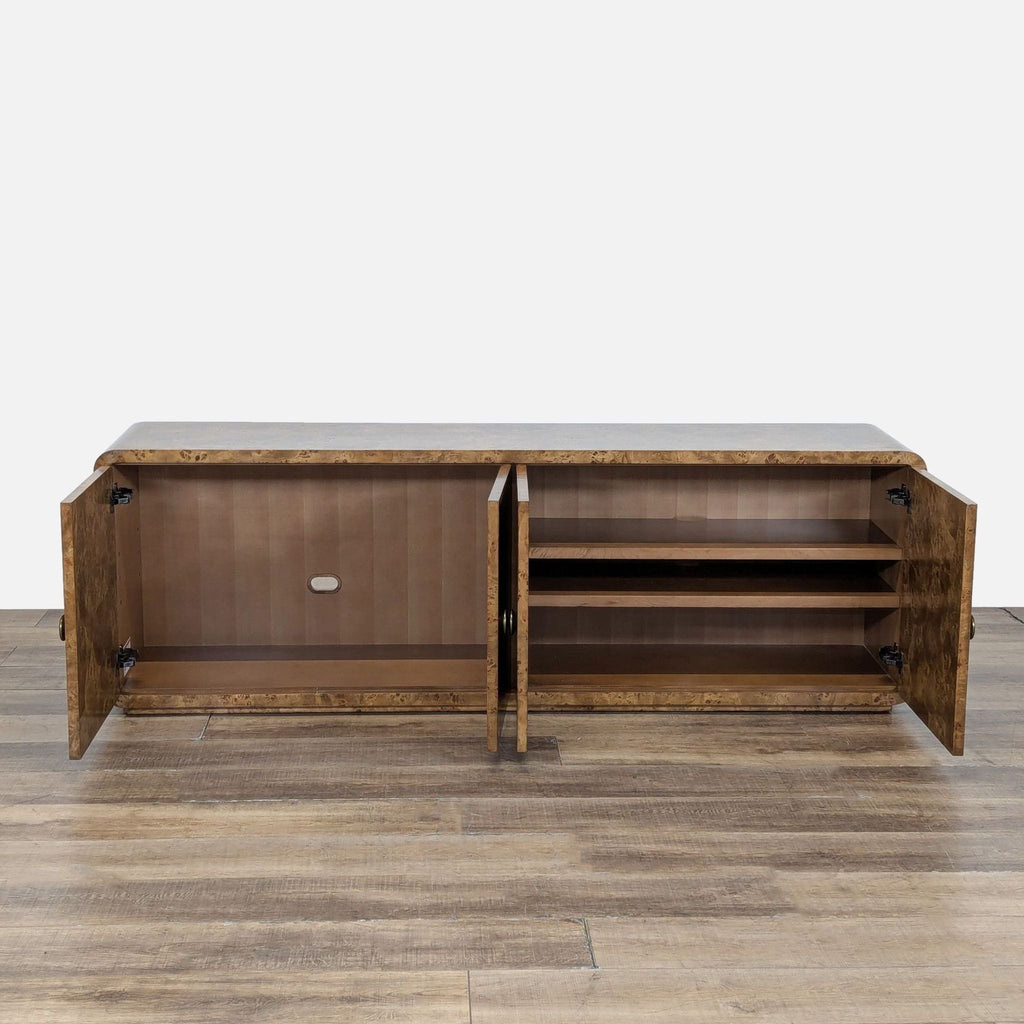 2. Entertainment center with doors open, revealing shelves and storage; features hand-finished mappa burl veneer.  