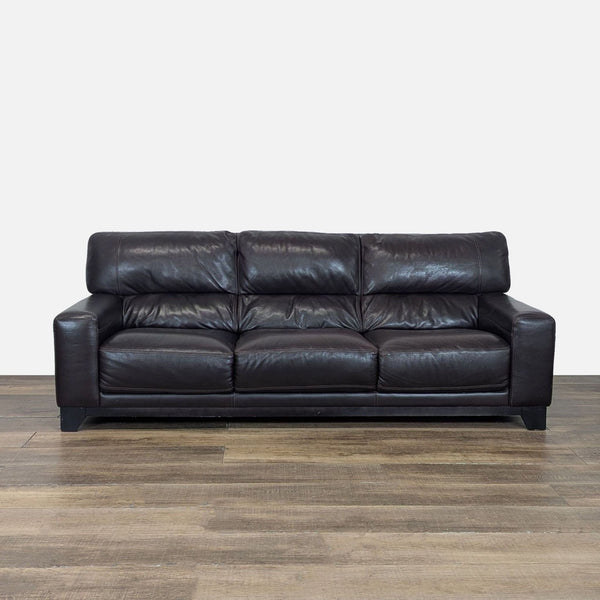 1. Front view of a Reperch 3-seat sofa with dark brown leather, plush cushions, and wood block feet.