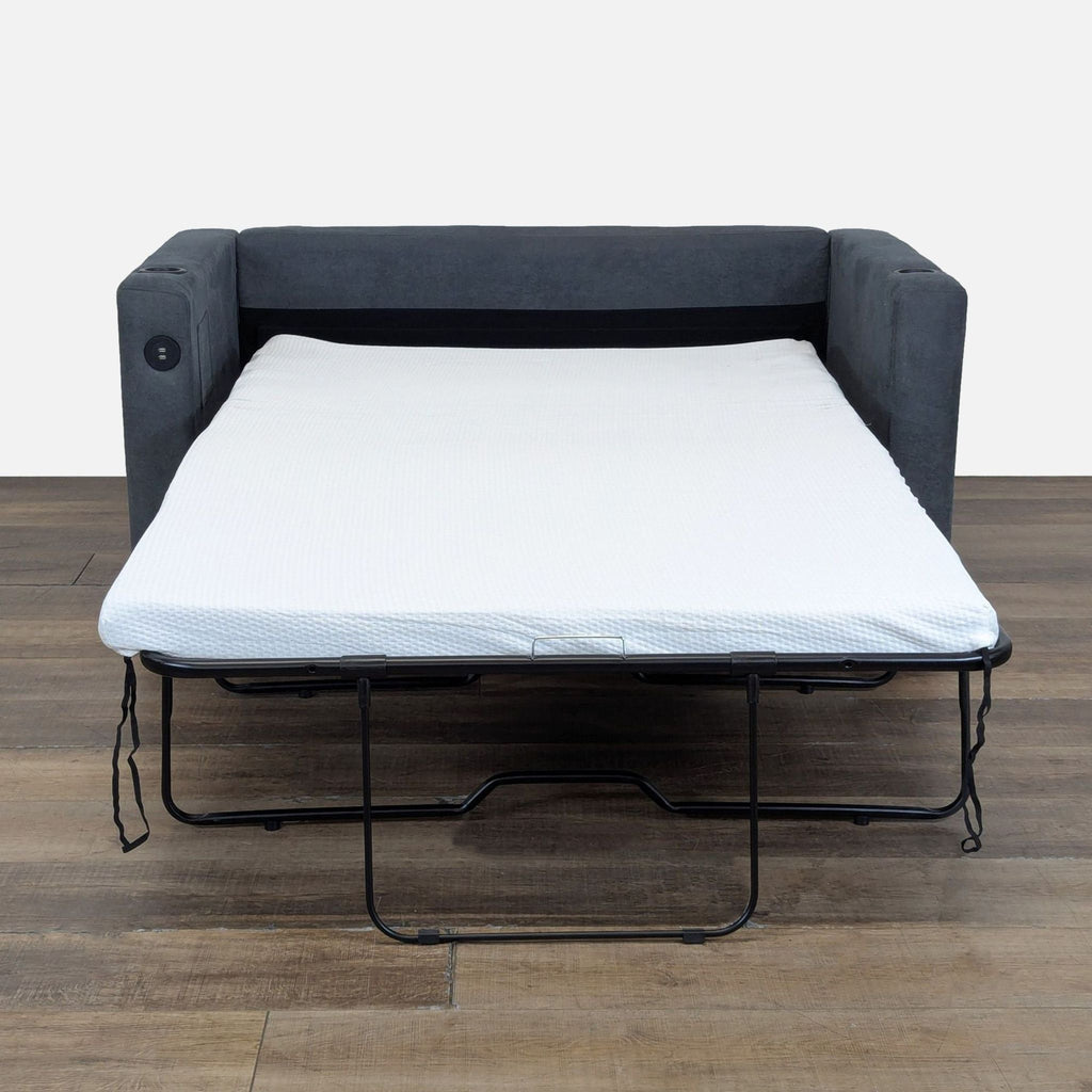 2. Wade Logan sleeper sofa fully extended, featuring a 3-inch memory foam mattress topper for extra comfort.  