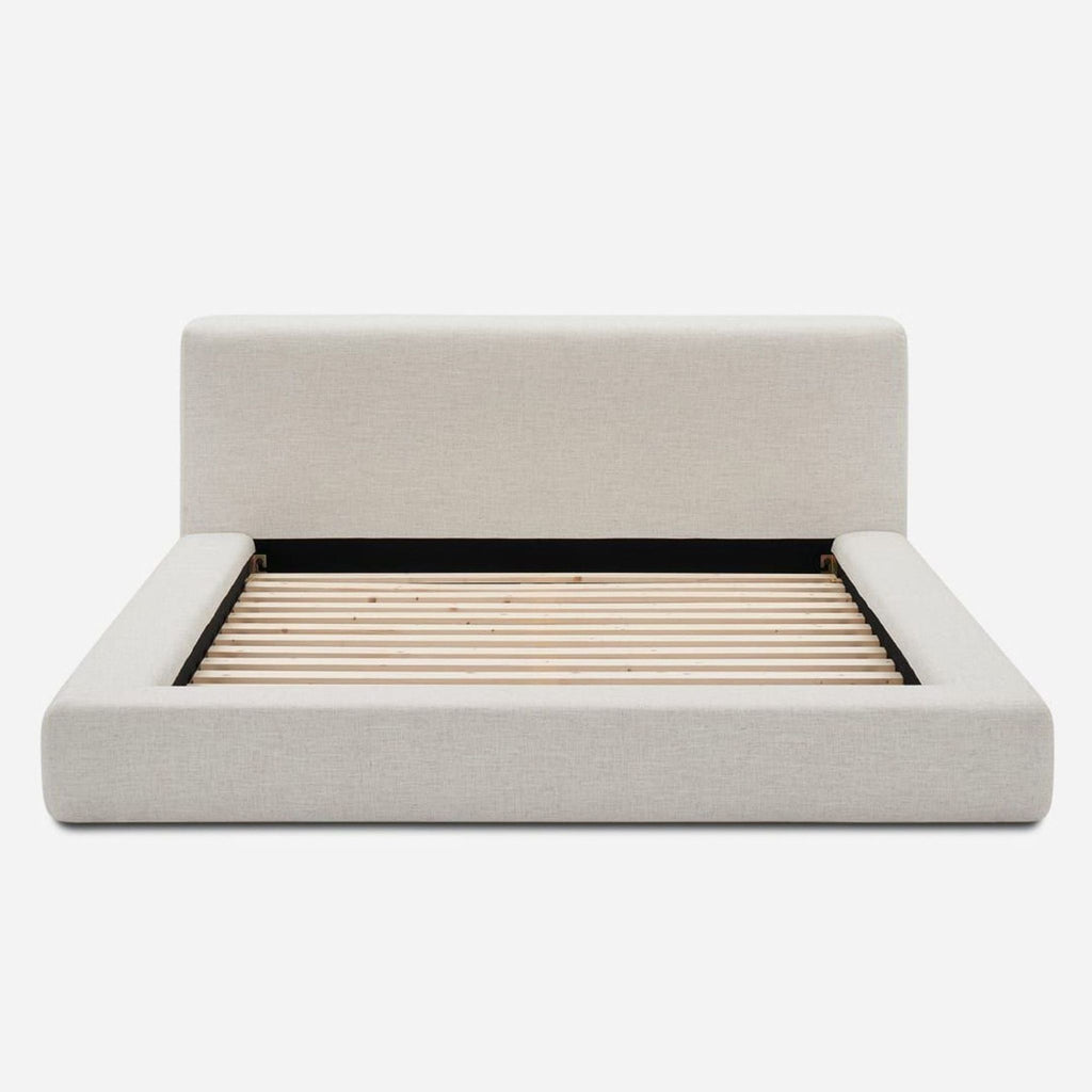 1. Front view of a king size padded bed frame and headboard in Beach Linen by Castlery, showing wooden slats.