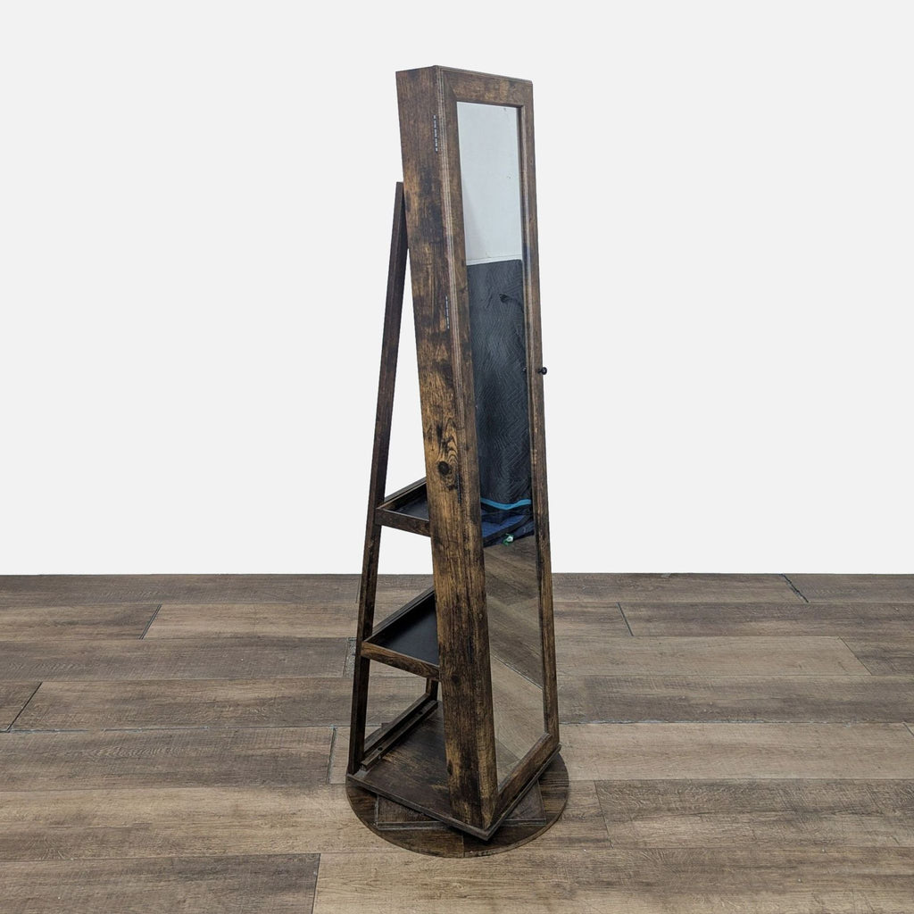 1. Side angle of a rustic Ameziel swivel jewelry armoire with mirror and open shelving, category Other.  