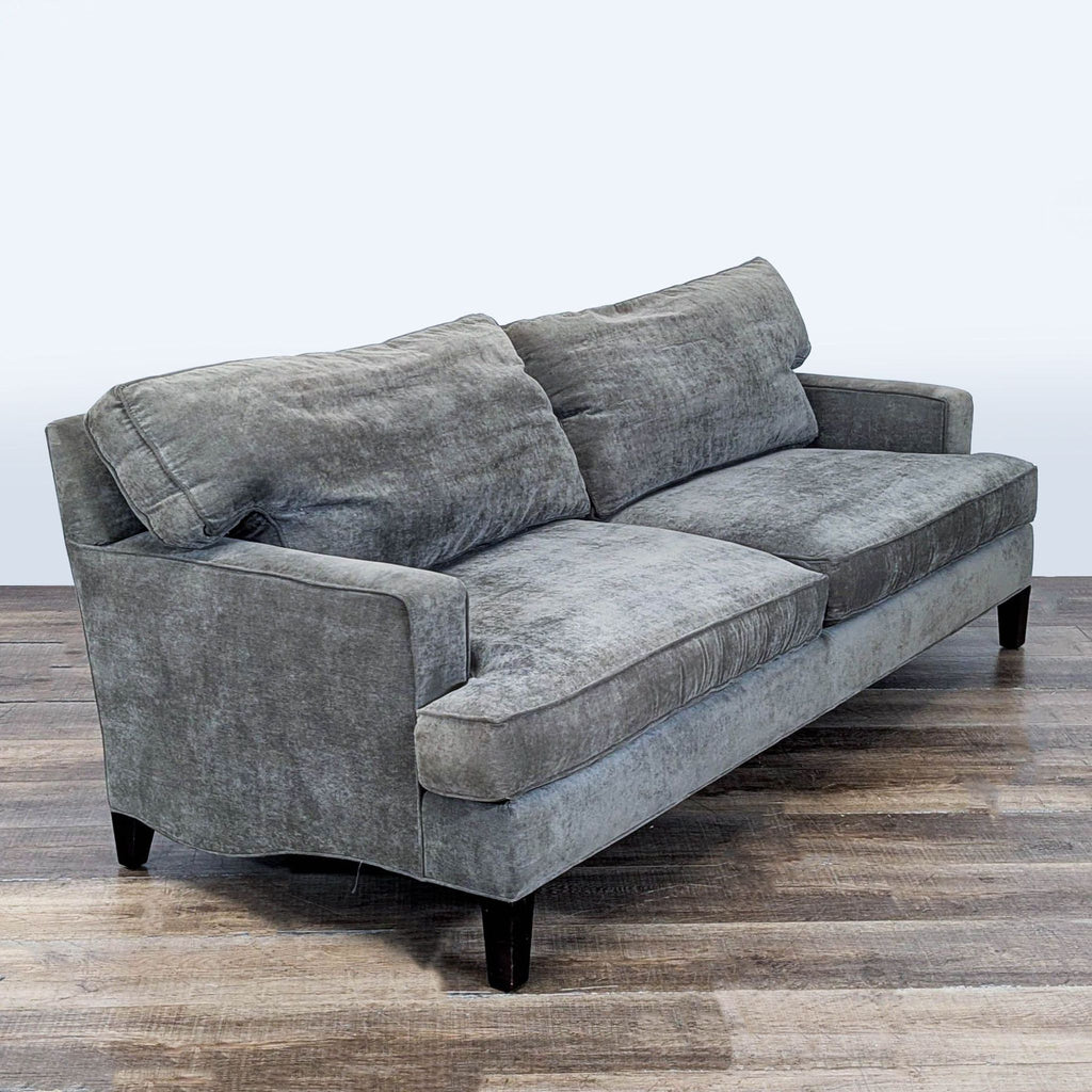 Angled Room and Board 3-seat sofa with sleek lines, square arms, and chenille fabric upholstery.