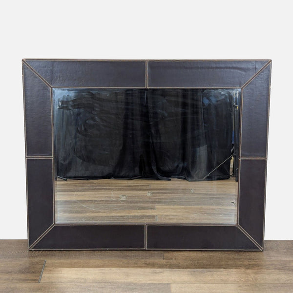 1. Rectangular Reperch mirror with wide dark leather frame and visible stitching, placed on a wood floor.