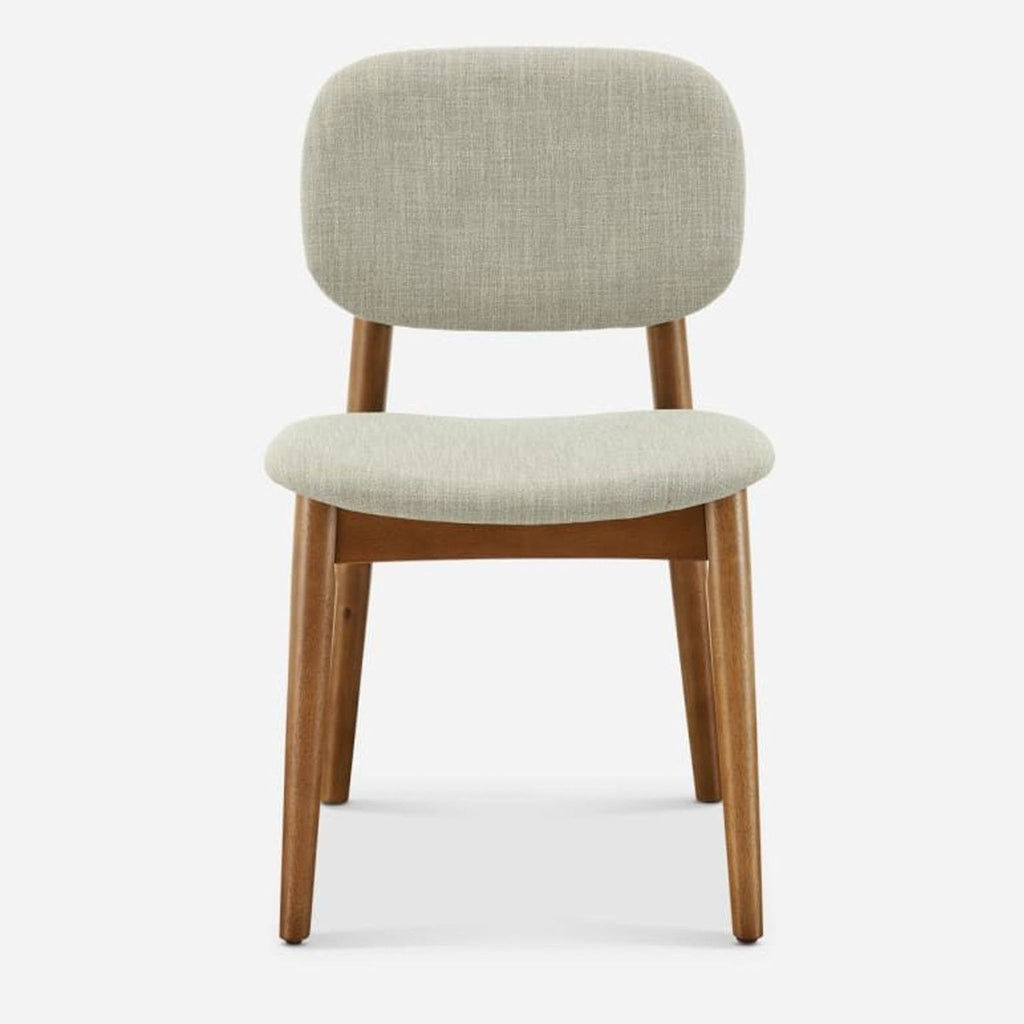 2. Front view of a Castlery dining chair showing fabric-upholstered, bent wood seat and back, with rubber wood legs.