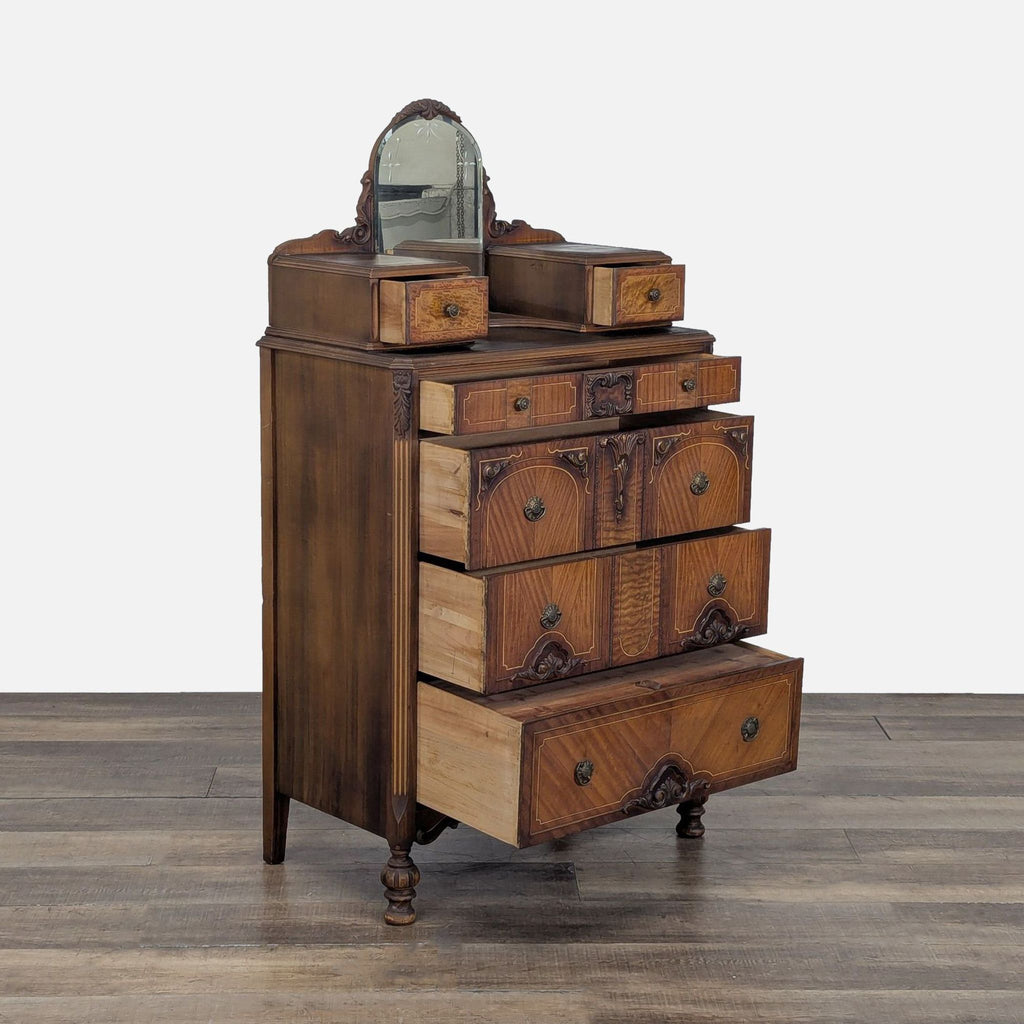 Side view of a Reperch dresser with open drawers, displaying dovetail joints and wood grain patterns.
