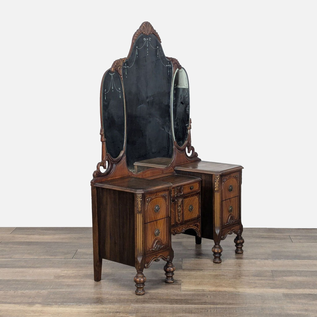 3. Angled view of Reperch antique dresser featuring five drawers and an elegant three-panel mirror design.