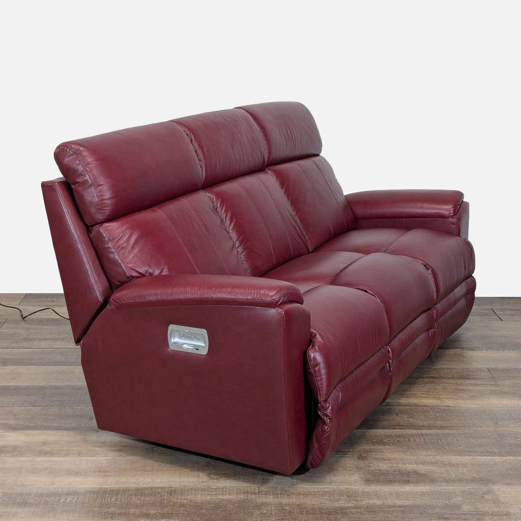 3. Angled view of a La-Z-Boy maroon leather 3-seat sofa featuring power recline and lumbar support.