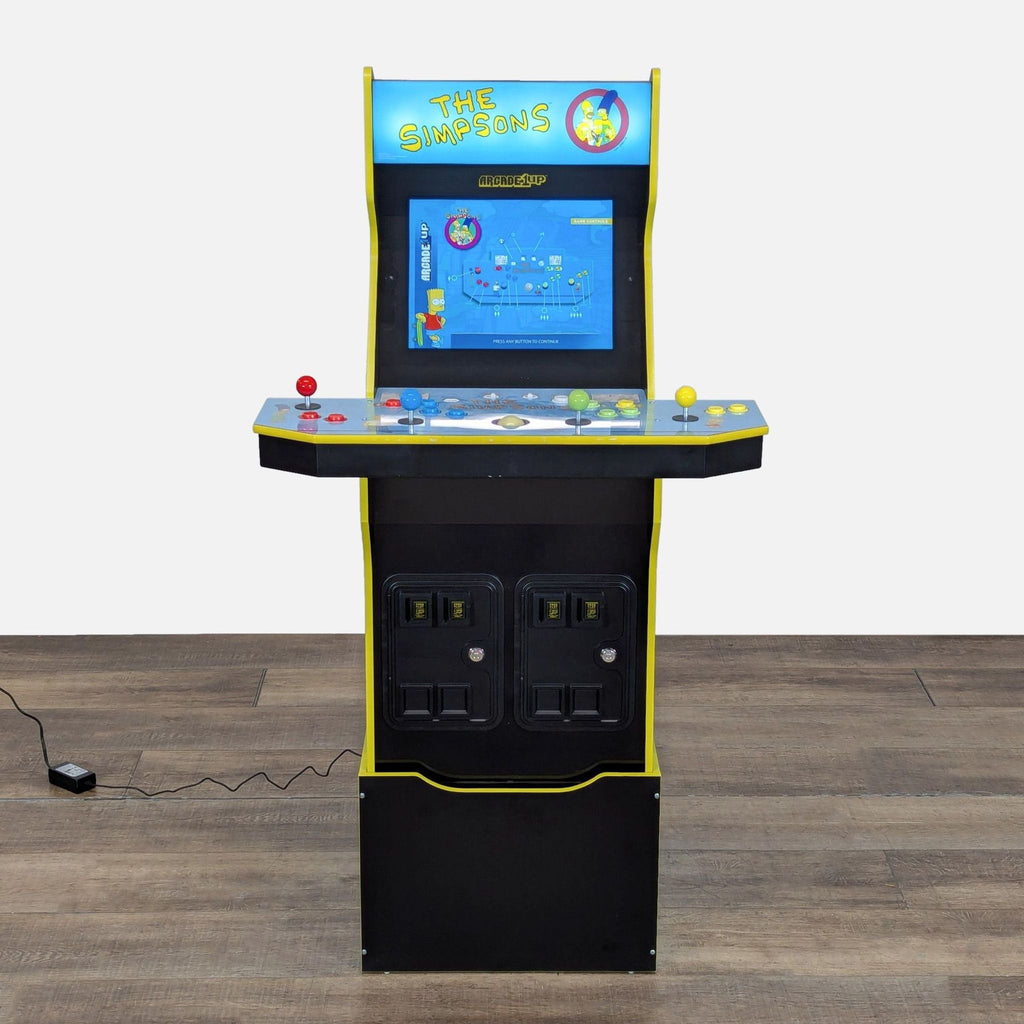 Arcade1Up The Simpsons arcade machine on wood floor, screen turned on displaying game selection menu.