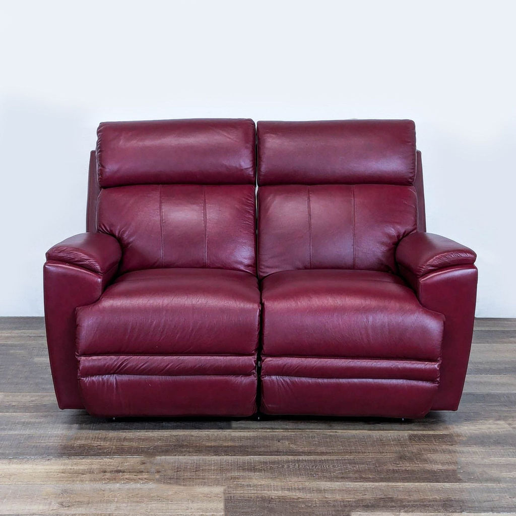 1. Maroon leather La-Z-Boy loveseat with plush cushions, power recline, and lumbar support, front view.