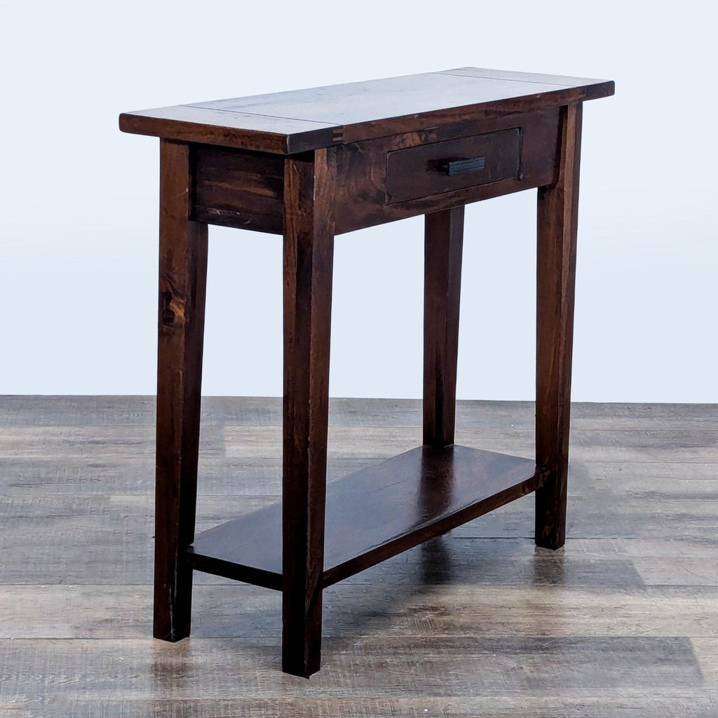 3. Cost Plus World Market side & console table in dark finish, with one drawer and a lower storage shelf.