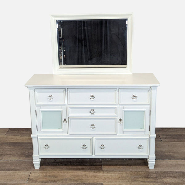 1. White Ashley dresser with seven drawers, two frosted glass cabinets, and a matching mirror on top.