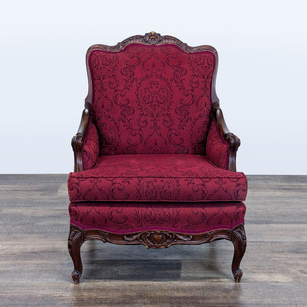 1. Reperch lounge chair with ornate wooden frame, cabriole legs, and burgundy damask baroque upholstery, front view.
