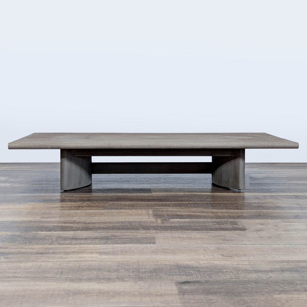 1. Weathered teak coffee table with a slat top and sculptured curved legs from Restoration Hardware.