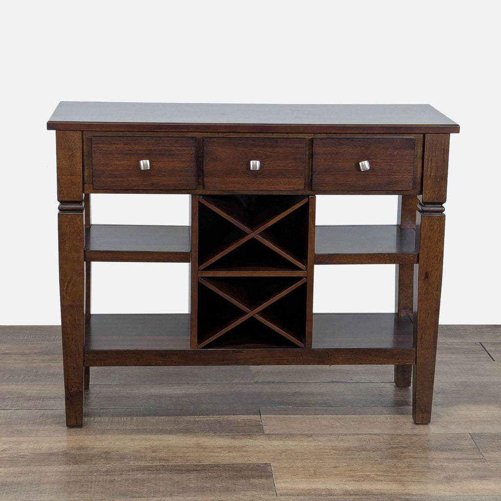1. Dark wood sideboard from Rooms To Go with three drawers, four shelves, and wine racks, shown head-on.