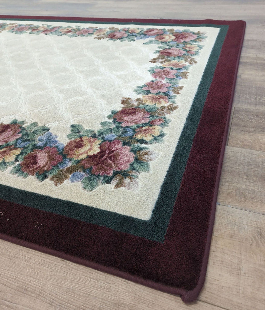 2. Close-up of Reperch rug corner reveals detailed floral pattern and high-density machine-made texture.