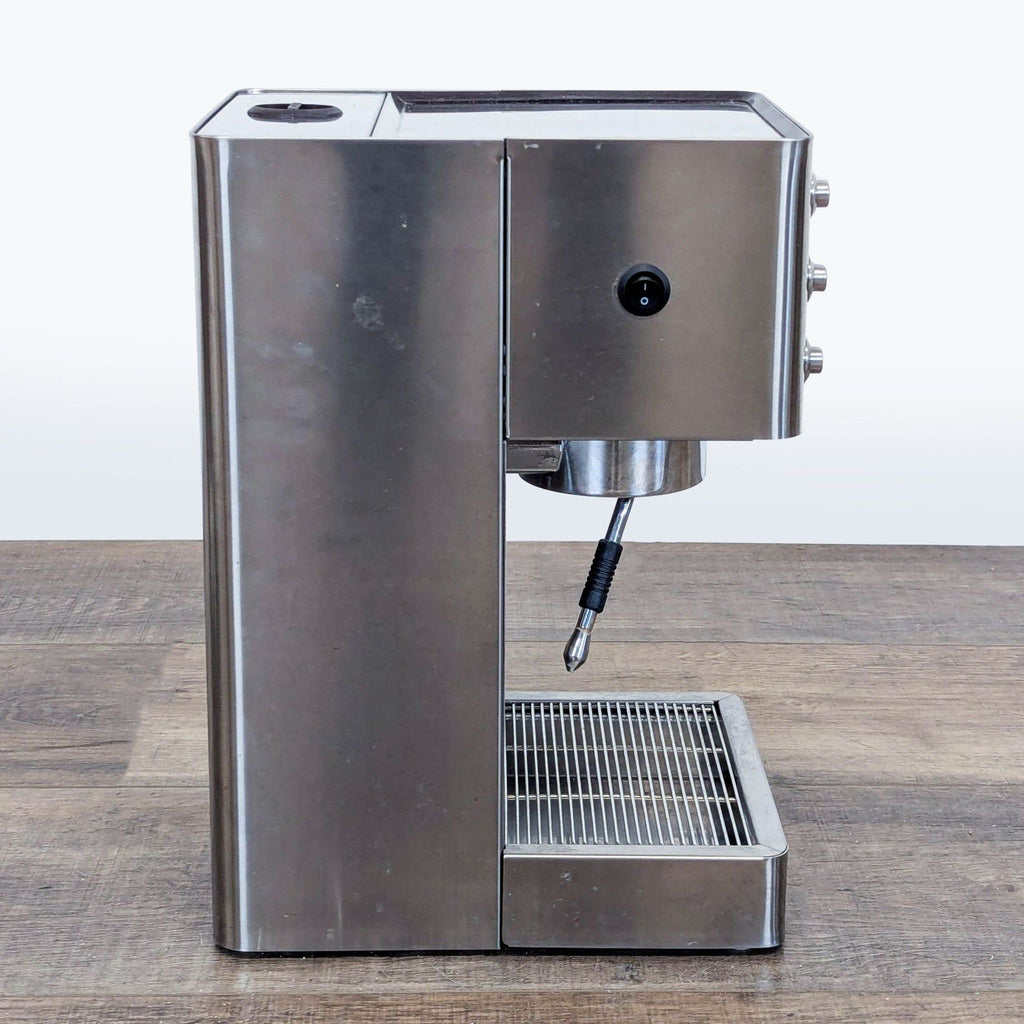 2. Side profile of the stainless steel Lelit Victoria PL91T espresso machine highlighting its compact design.