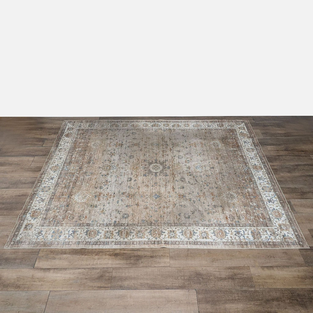 1. Reperch polyester rug with a vintage floral border design, shown on wooden floor, machine washable and non-slip.
