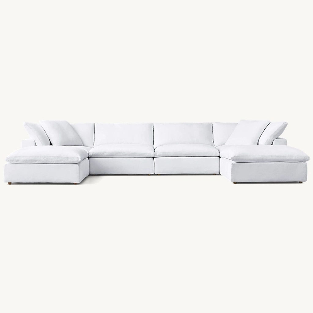 Wide white Restoration Hardware Cloud sectional sofa shown from the front, highlighting its soft, deep seating.  