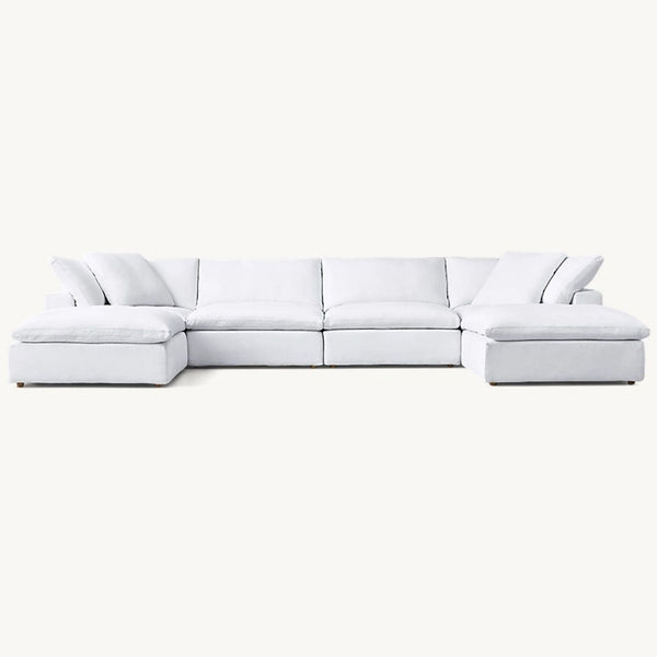 Wide white Restoration Hardware Cloud sectional sofa shown from the front, highlighting its soft, deep seating.  